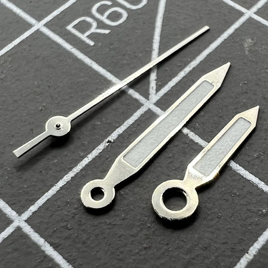 12mm silver-trimmed arrow shape green lume watch hands for Miyota 1M12 movement, precision fit, brand-crafted.