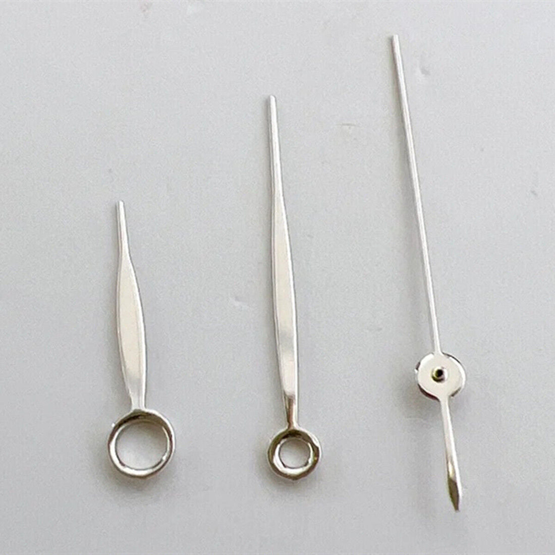 13mm silver watch hands set, compatible with NH35/NH36/4R/7S movements, precise fit for repairs.