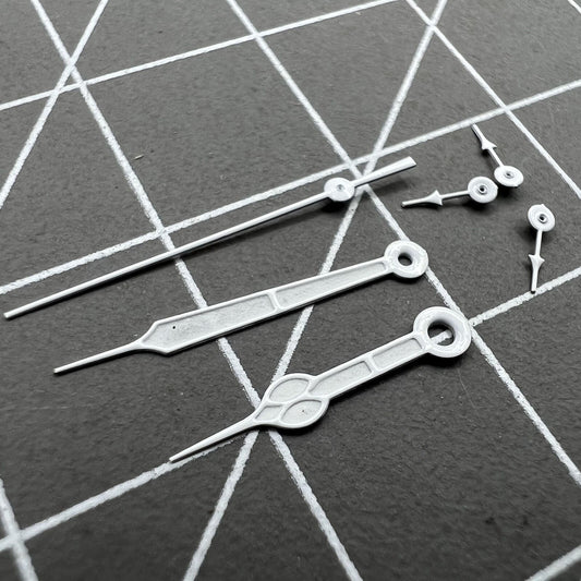 Silver-trimmed green luminous watch hands set for Miyota 0S20 quartz movement, enhancing dial visibility.