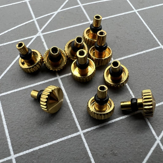 Golden watch crown for Orient watch movement, durable replacement part for precise timekeeping.