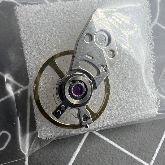 Silver complete balance wheel with splint compatible with Miyota 8N24 movement, crafted in Japan by Miyota.
