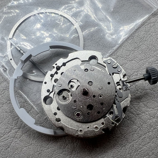 Miyota 8245 automatic movement watch with silver skeleton dial featuring 2 hands, elegant design.
