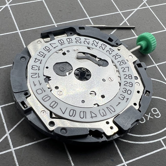Miyota OS11 quartz watch movement showcasing precision timekeeping components for watch accessories.