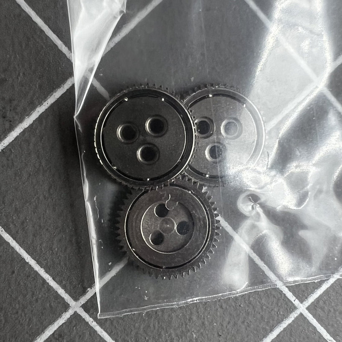 Set of 3 ball bearings compatible with Miyota 9015 watch movement, enhancing smooth rotation and durability.