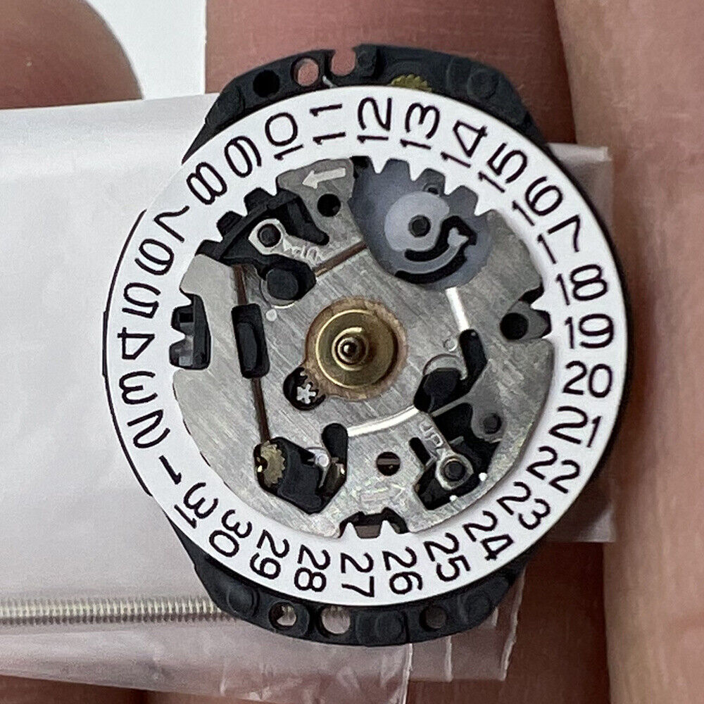 Hattori Epson VX82E quartz watch movement with date display at 3, made in Japan.