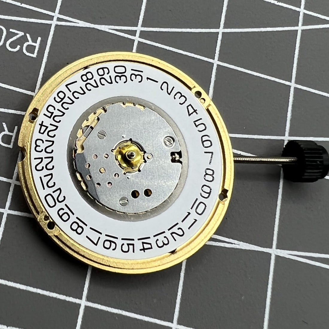 ETA F05.111 Swiss quartz watch movement displaying 3 hands and date at 3 o'clock, precision timekeeping by ETA.