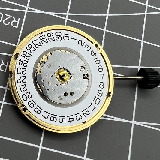 ETA F05.111 Swiss quartz watch movement displaying 3 hands and date at 3 o'clock, precision timekeeping by ETA.