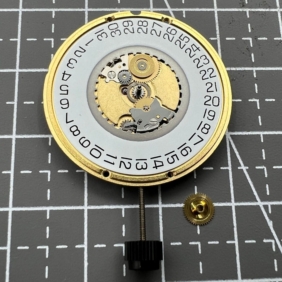 ETA 955.112 Swiss quartz watch movement with 3 hands and date window at 3 o'clock, precision timing.