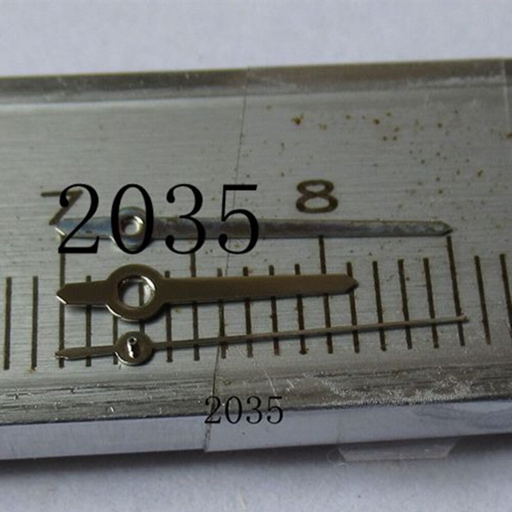 Silver polished arrow-shaped watch hand by Miyota, compatible with movements 2035, 2115, 2105, 2305, 2315.