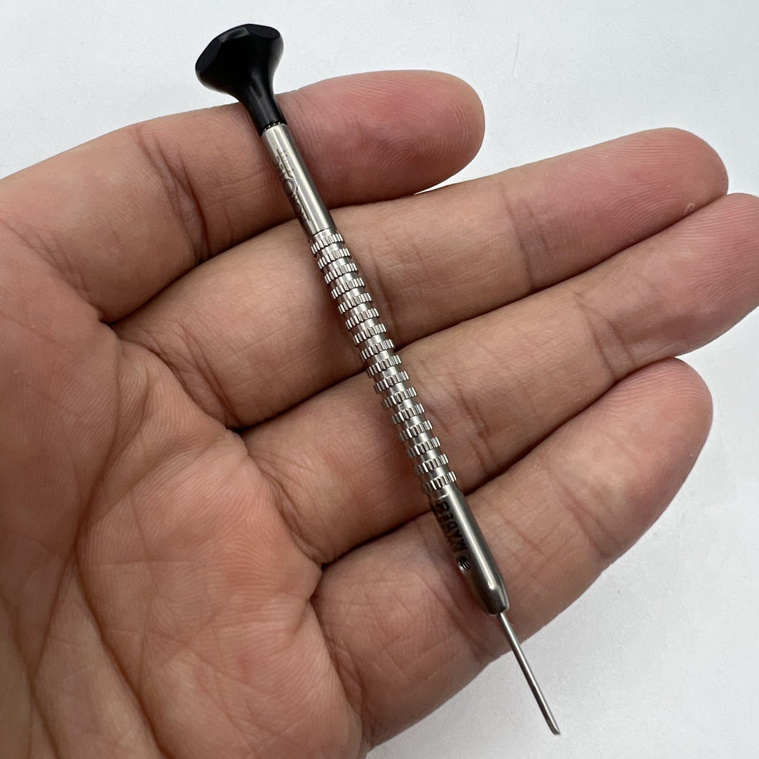 Horotec MSA01.218-100 black 1.00mm watchmakers screwdriver for precise watch repair tasks.