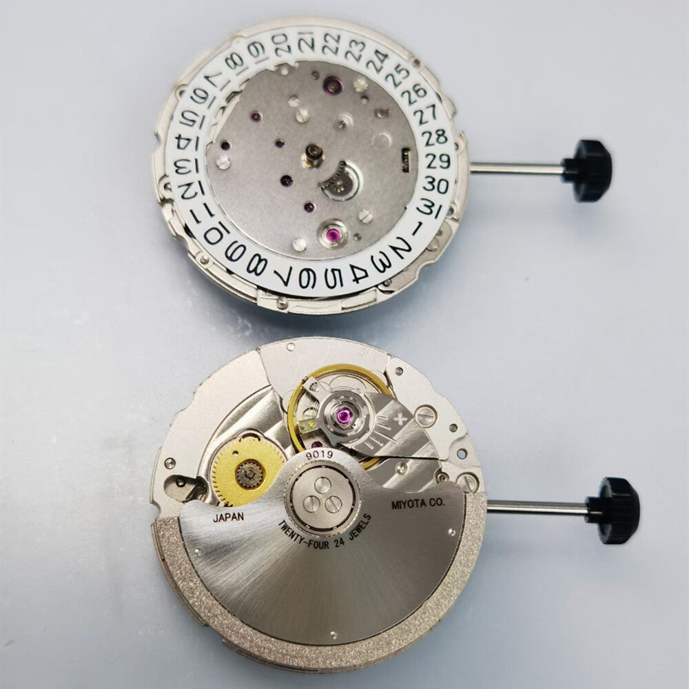 Miyota/Citizen 9019 automatic mechanical watch movement with date display at 3 o'clock and 6 o'clock position.