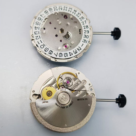 Miyota/Citizen 9019 automatic mechanical watch movement with date display at 3 o'clock and 6 o'clock position.