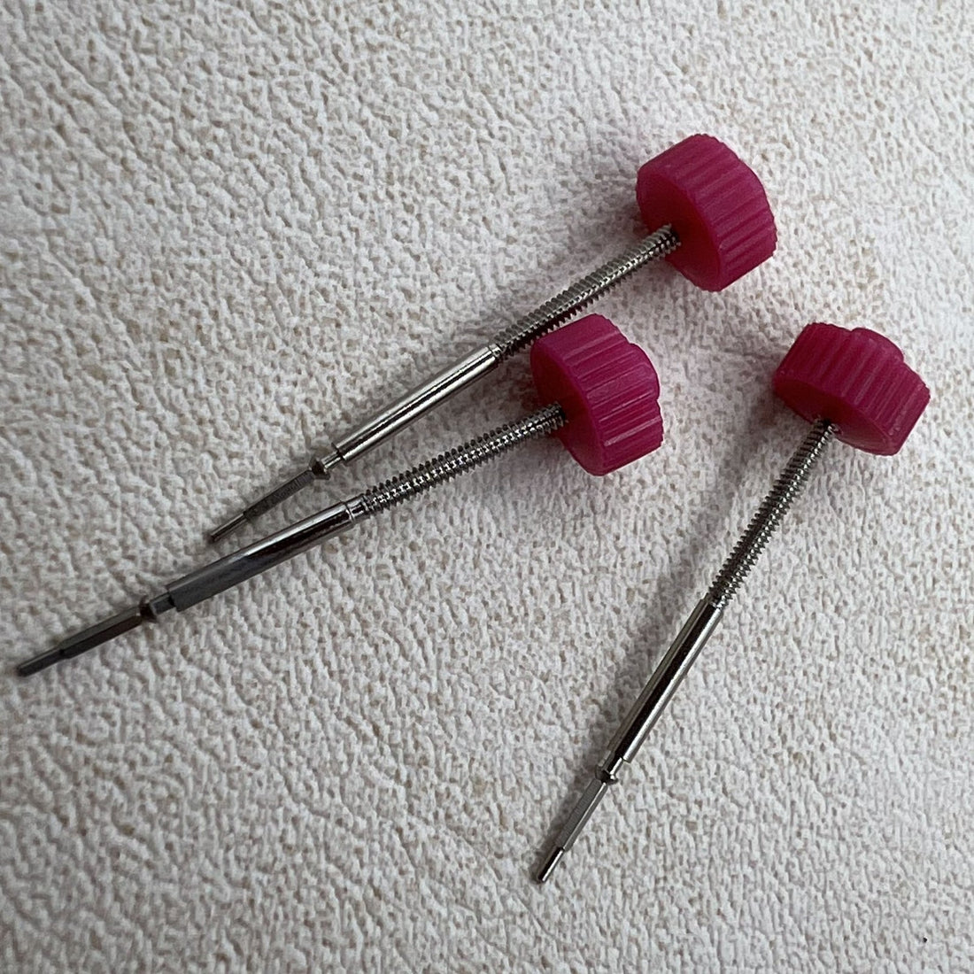 Set of 5 watch winding stems compatible with Ronda 705 movement, precise fit for repairs.