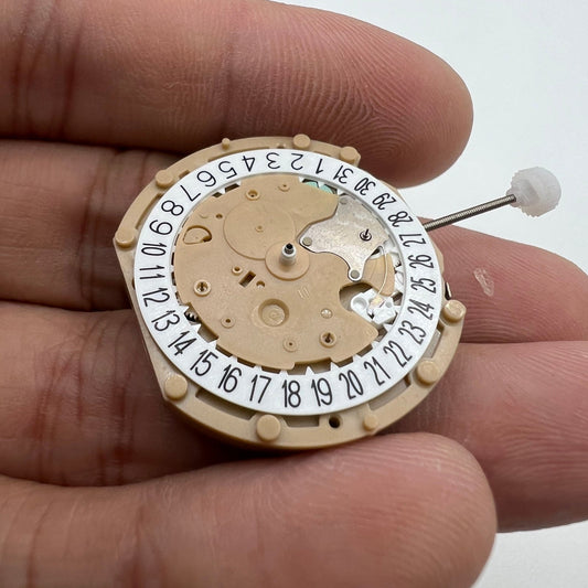 Sunon PE60 quartz watch movement with 3 hands and date at 6 o'clock for precise timekeeping.