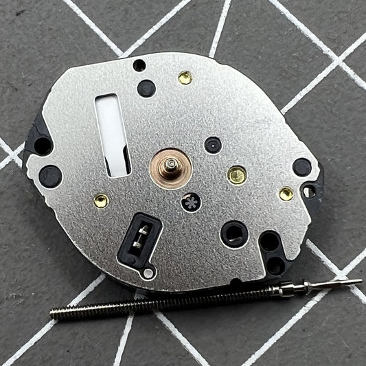 Hattori Epson TMI Y120 HCP0 Quartz watch movement with precision gear components for accurate timekeeping