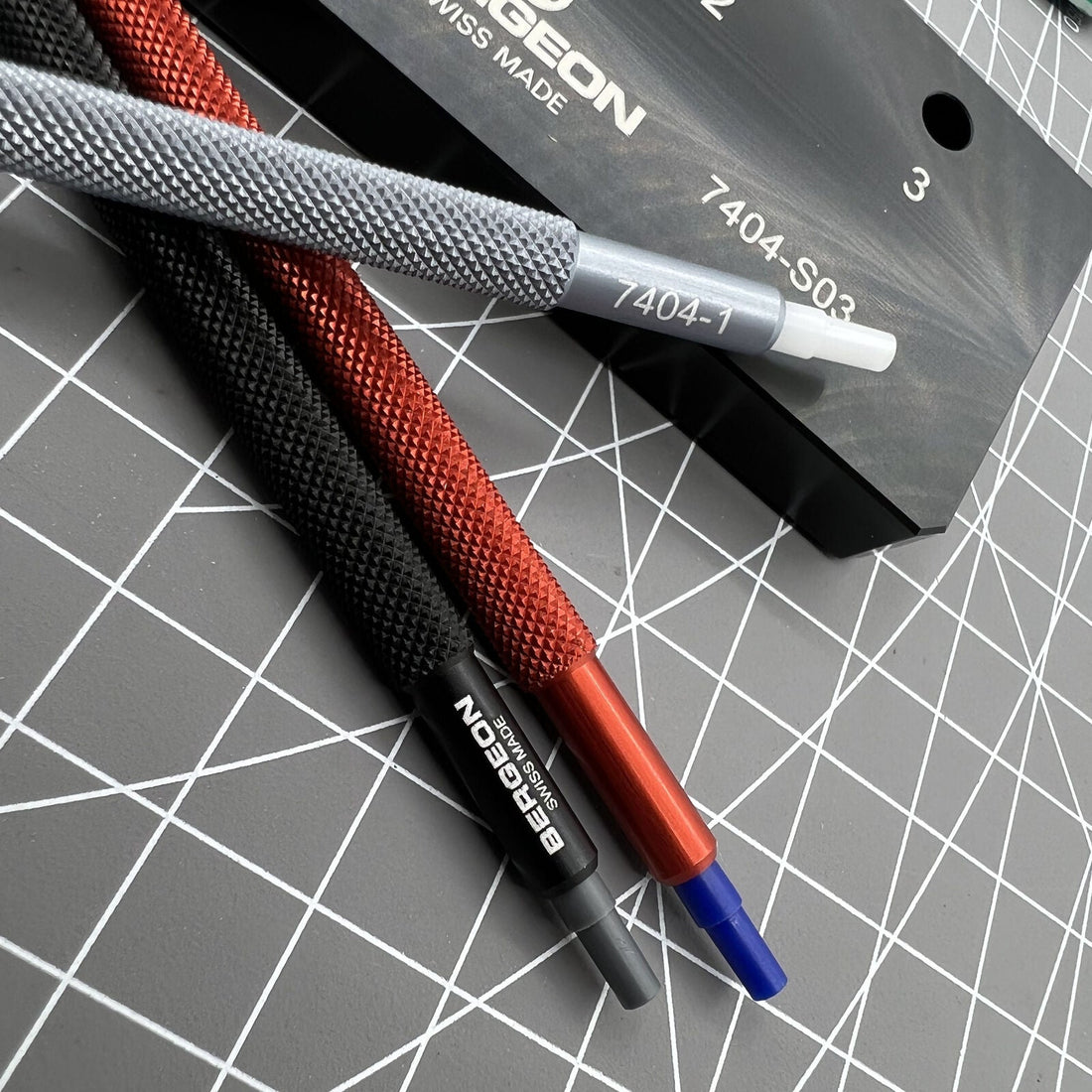 Bergeon 7404-S03 Swiss Made watch hand fitting tool set of 3 with sturdy base for precise watch repair.