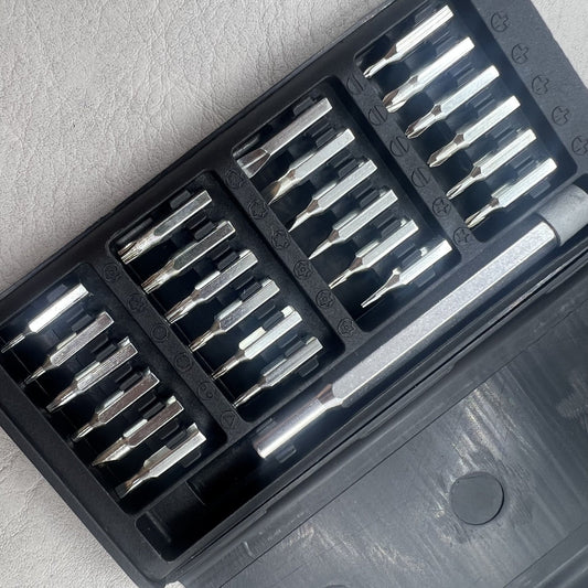 Precise 24-in-1 magnetic alloy multitool screwdriver set by Pr�zisions for versatile watch accessory repairs