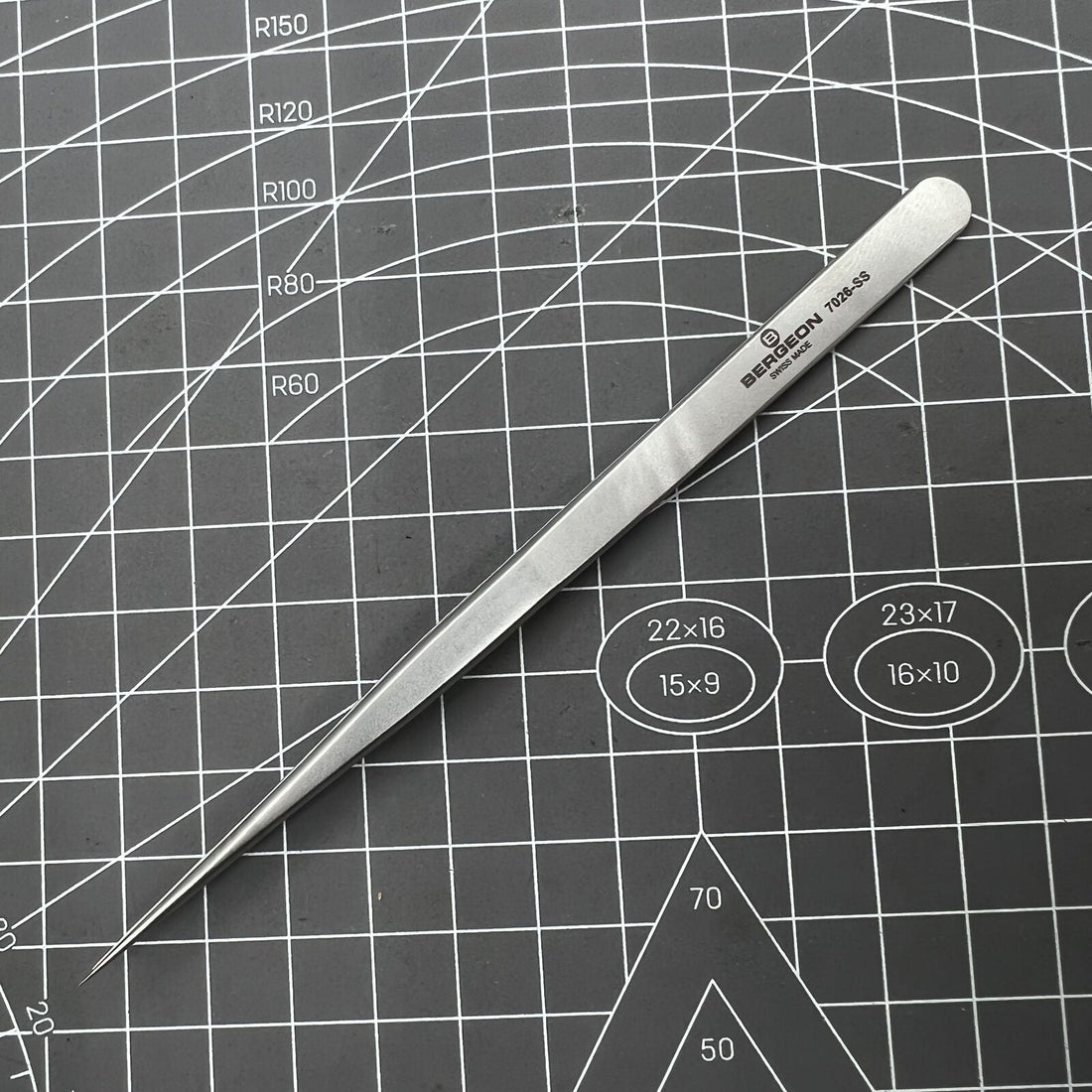 Swiss Bergeon 7026-SS antimagnetic tweezer with narrow, fine points for precision watch repair and accessory handling.