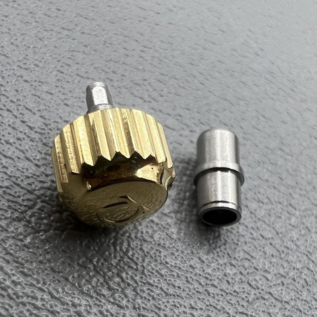 6.3mm gold watch crown with tube for OMEGA Seamaster 300, enhancing repair precision and style.