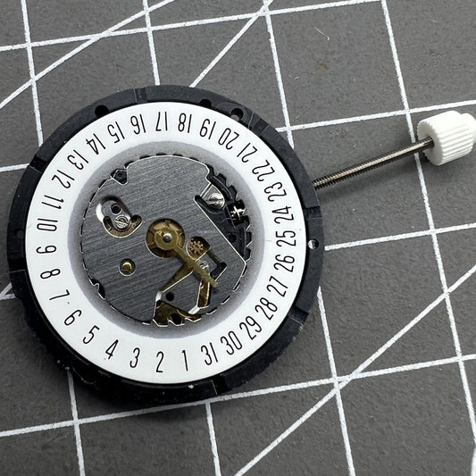 ISA 330 quartz watch movement with date display at 6 o'clock, ideal for precise timekeeping.