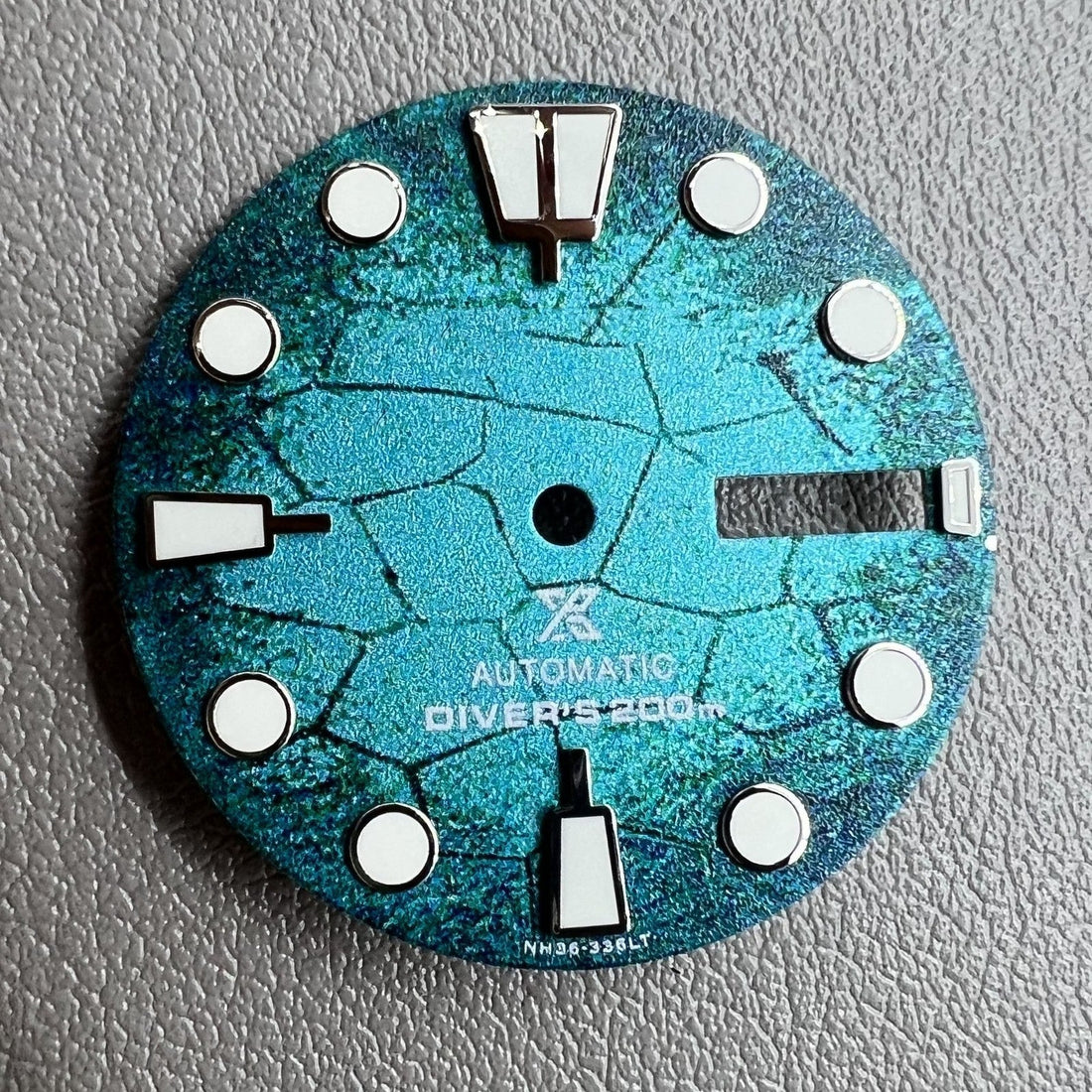 Blue diving watch dial with green luminous markers, compatible with NH35 NH36 movement, for precise timekeeping.
