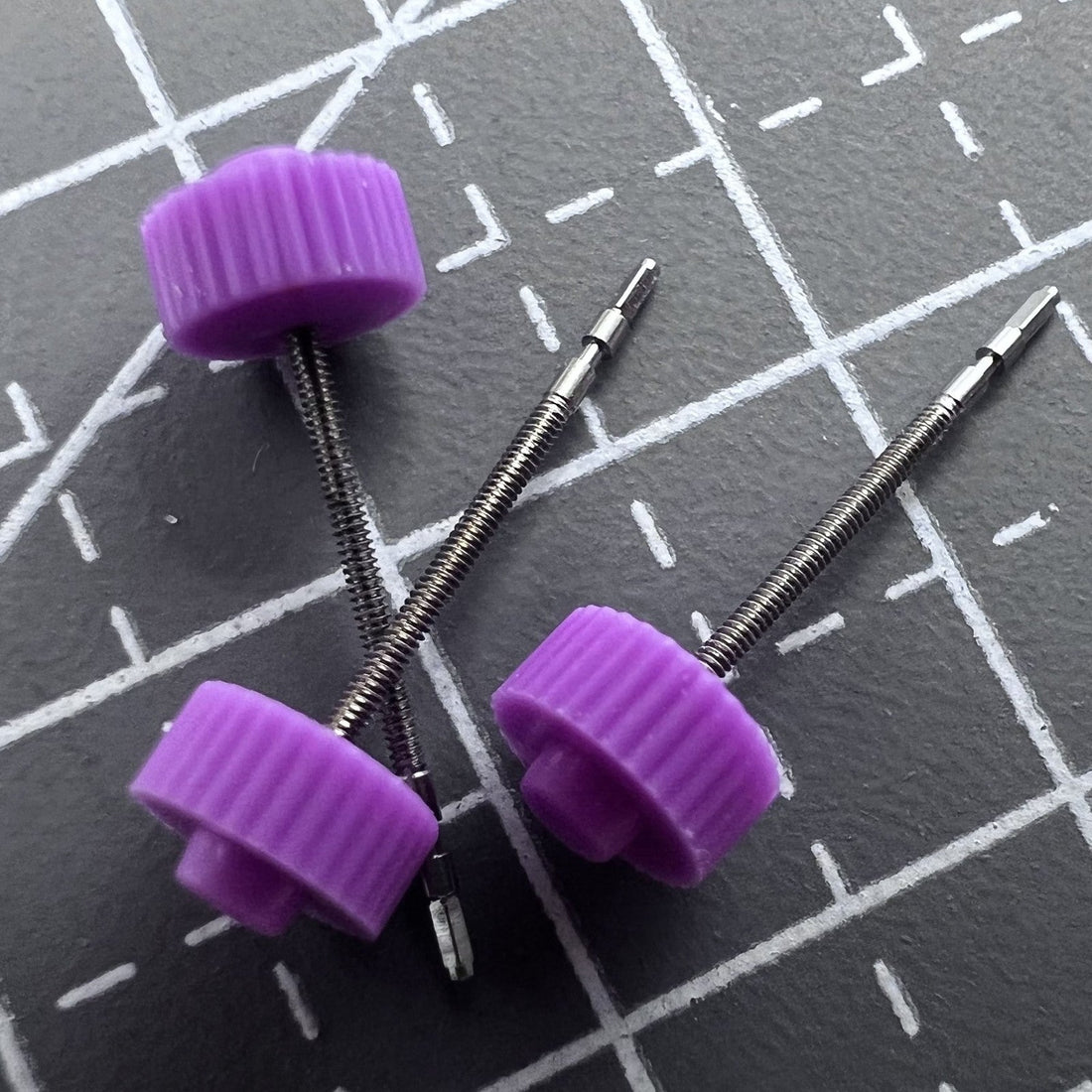 Set of 5 replacement watch stems for Ronda 1042 movement, compatible with various models.