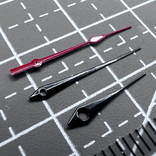 Set of 2 black and red watch hands with green luminous tips for Ronda 515 by Uhrzeigersatz