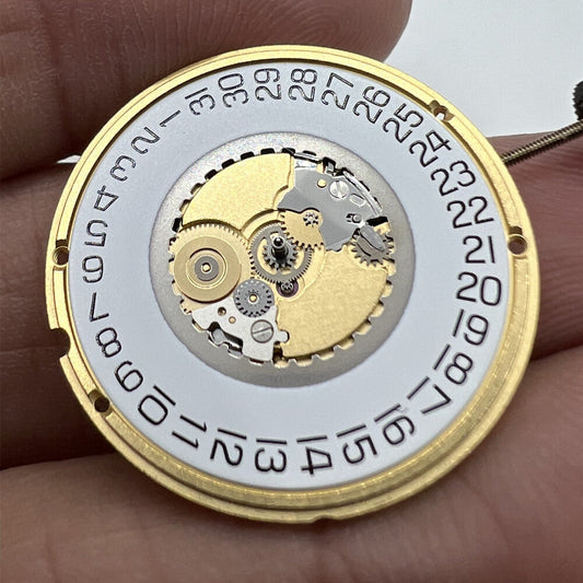 Swiss ETA 955.112 quartz watch movement with 3 hands and date at 3 o'clock, precision timekeeping essential for watch repair.