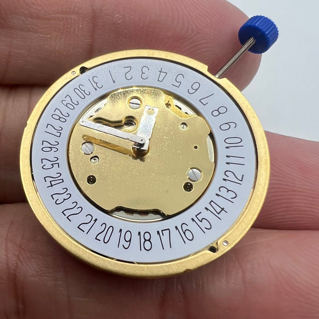 Swiss Made Ronda 5030D quartz watch movement with date display at 6 o'clock for precision timekeeping.