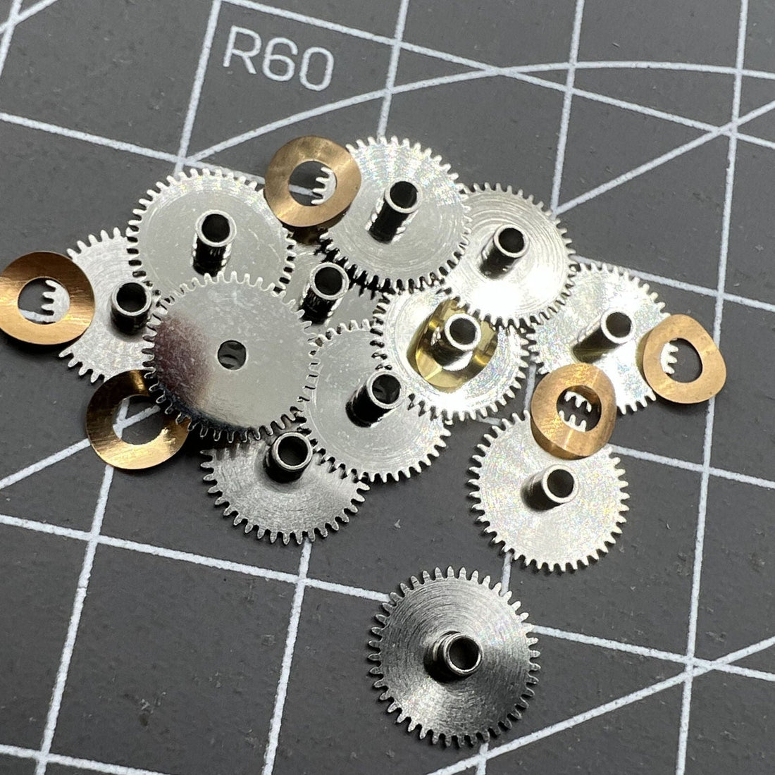 Hour wheel and train bridge for Seagull ST3600 and ETA6497 watch movements, precision fit component.