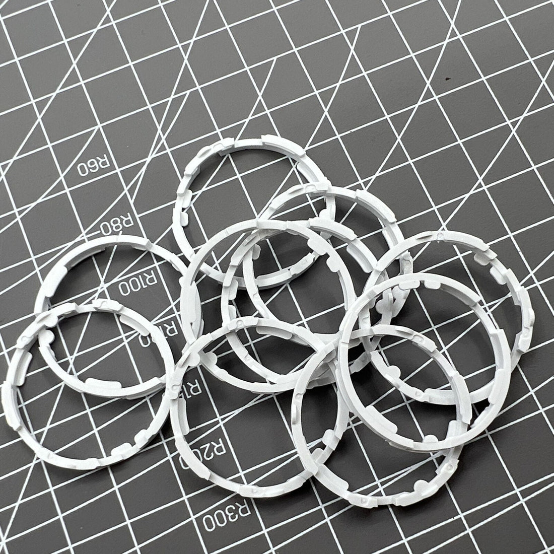 1. Set of 5 Miyota 8200 series movement cushion mount spacer rings for secure watch assembly.  