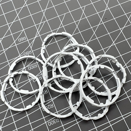 1. Set of 5 Miyota 8200 series movement cushion mount spacer rings for secure watch assembly.  