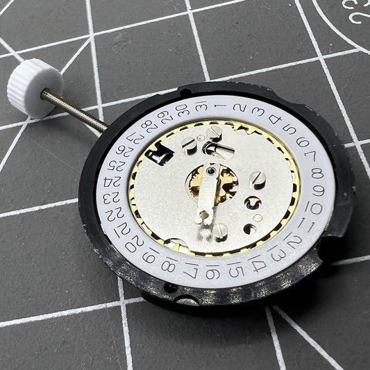Ronda 585 Date At 3 quartz watch movement showing date window at 3 o'clock for accurate timekeeping.