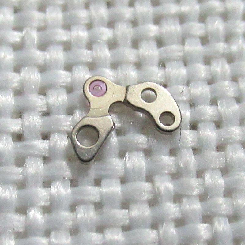 Watch fork wheel bridge splint compatible with NH05 NH06 movements, precision fit for repair and assembly.