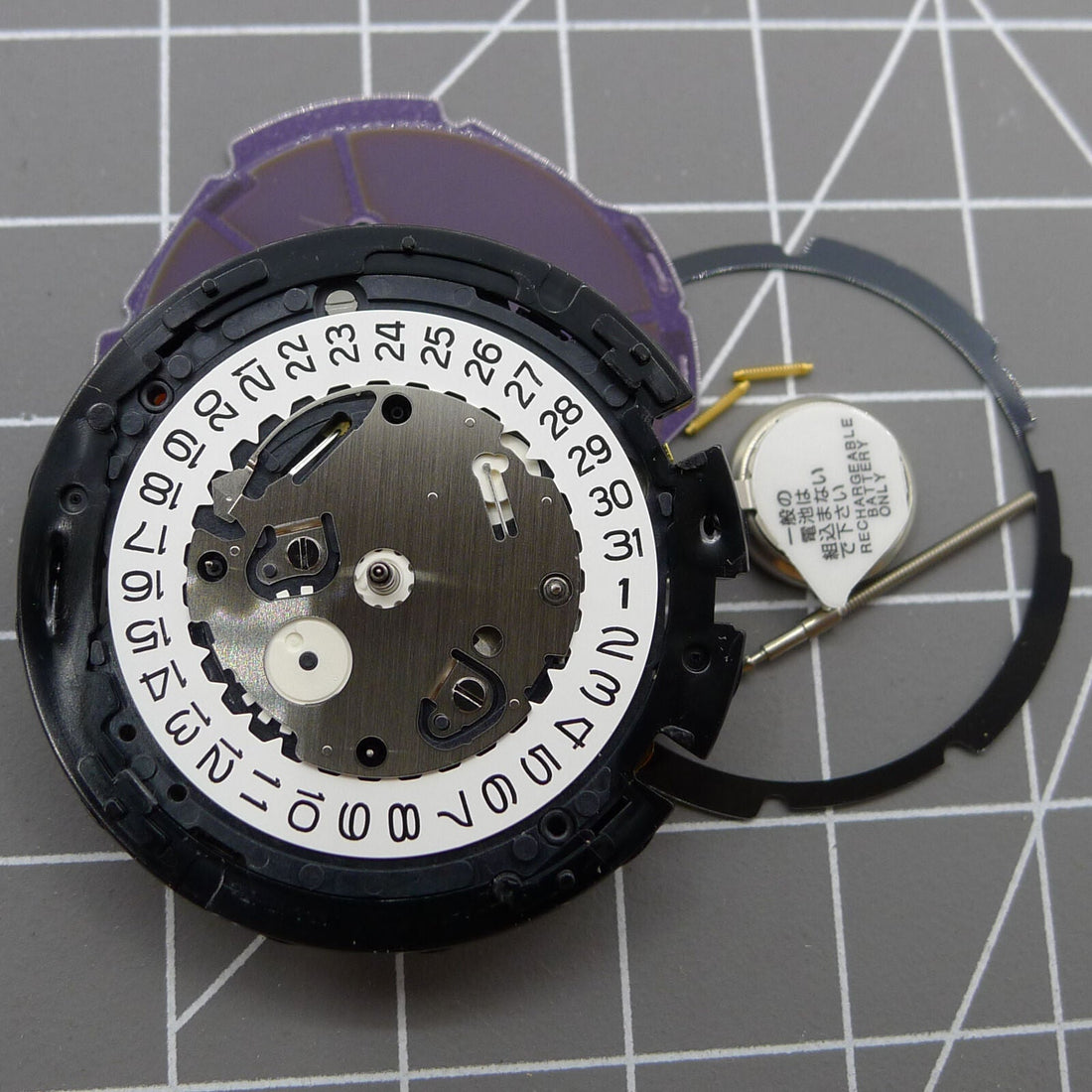 Japan Made Hattori Epson TMI VS75B solar-powered quartz watch movement for precise timekeeping.