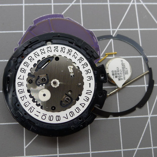 Japan Made Hattori Epson TMI VS75B solar-powered quartz watch movement for precise timekeeping.