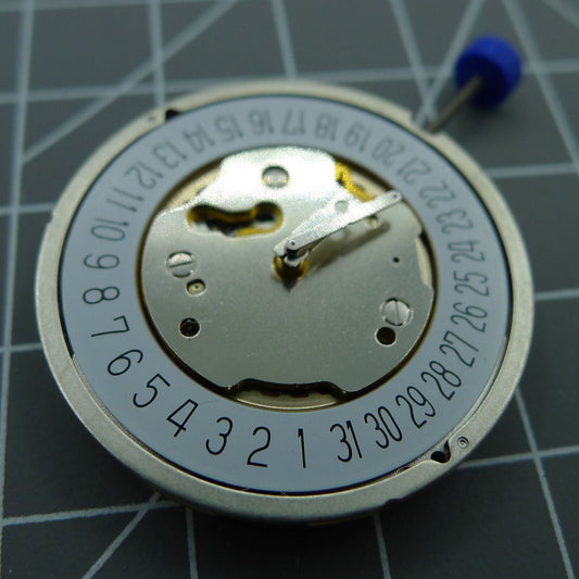 Ronda 5021D Swiss quartz watch movement with date display at 6 o'clock for precision timing.
