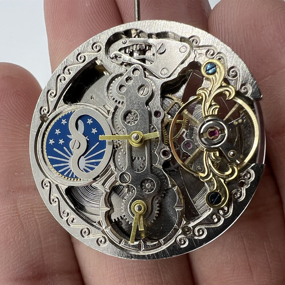 Silver automatic mechanical watch with 3 hands and hollow moon phase at 12