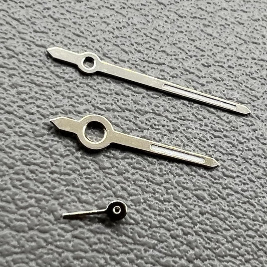 Set of 2 silver trim green luminous watch hands for Miyota 1L45 movement, 11mm length, brand quality.