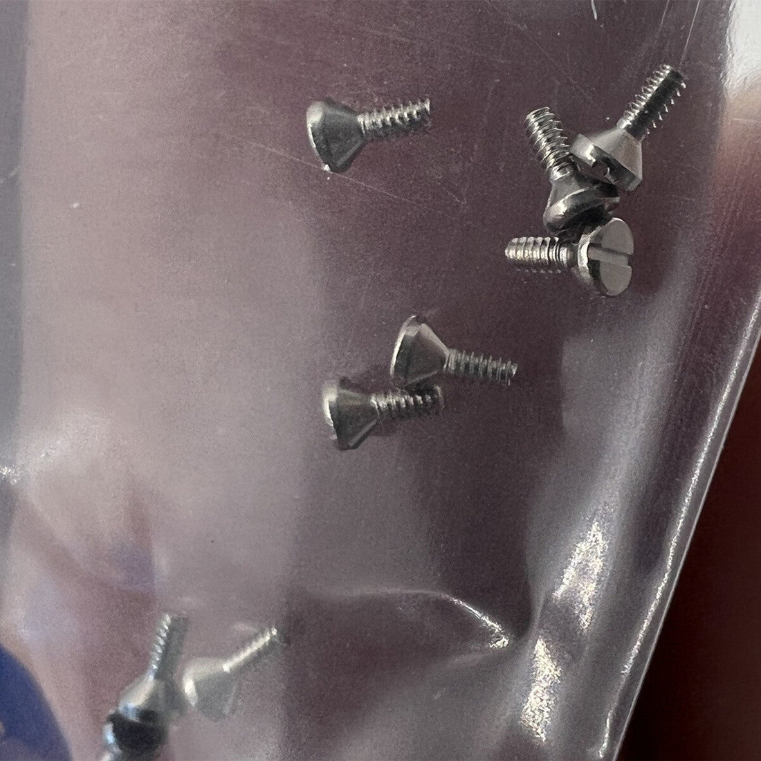 Precision Movement watch screws for Miyota 8200 dial foot pin parts, ideal for watch repairs and assembly.