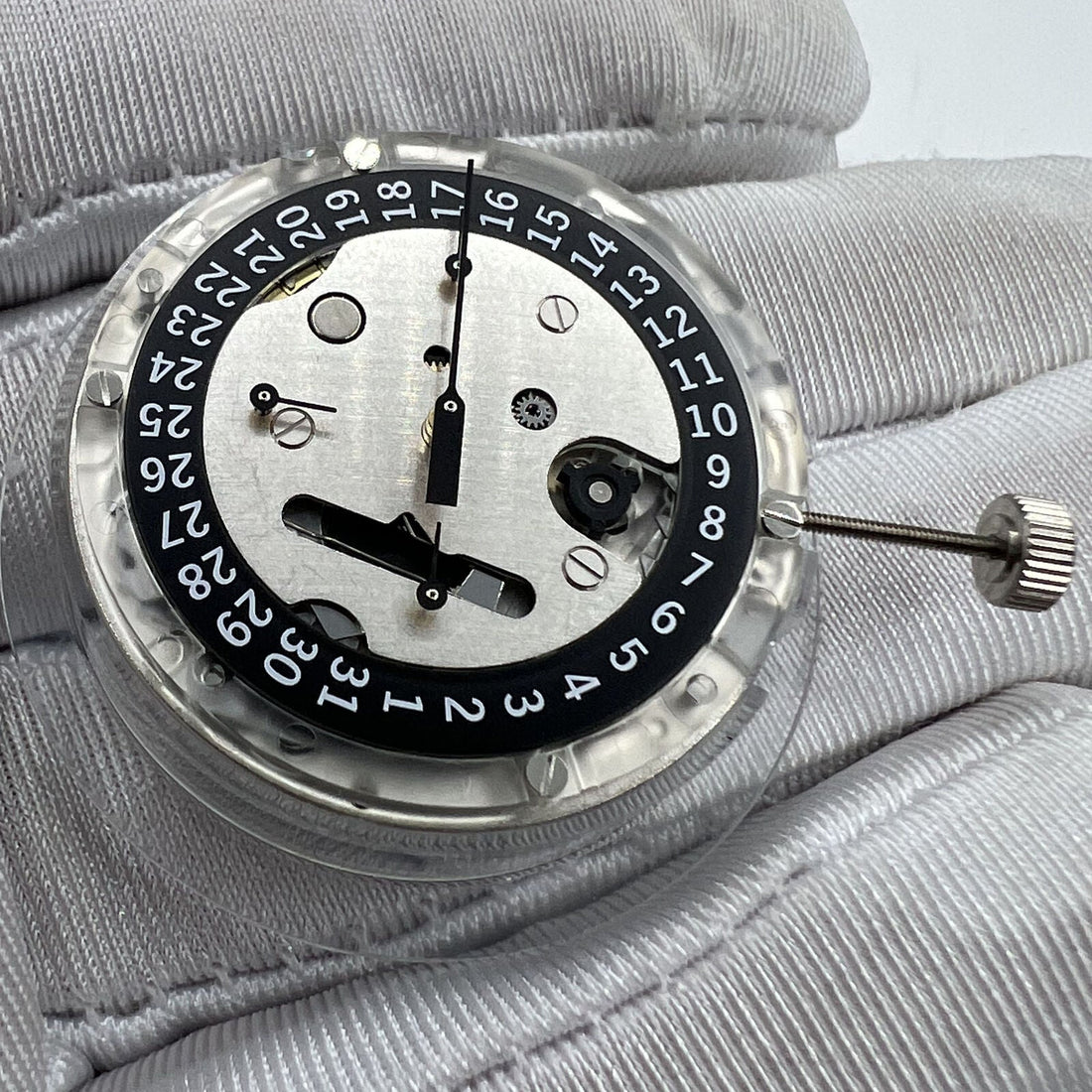 Swiss Made ETA C01.211 chronograph watch movement with black dial, mechanical precision by 1853 brand.