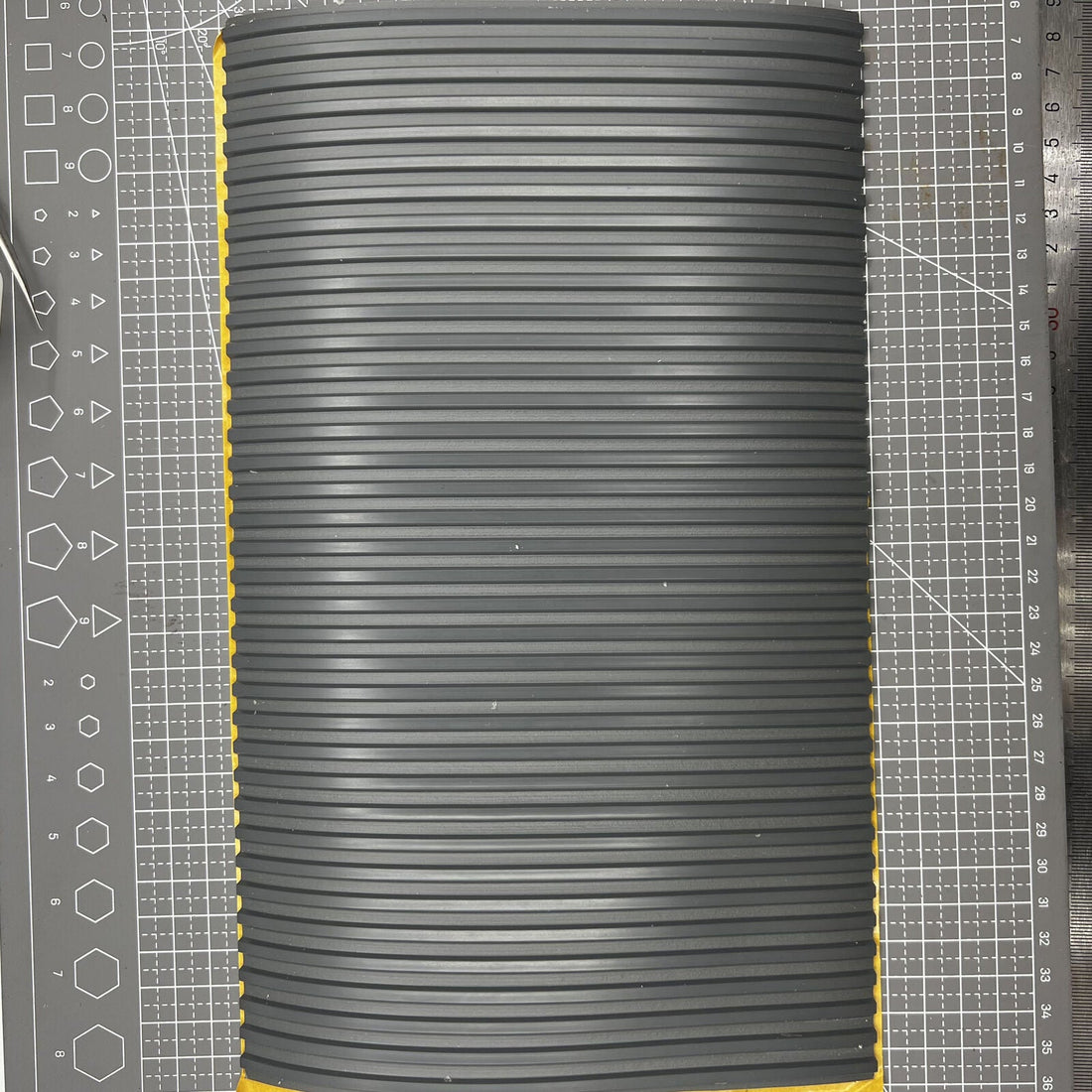 Swiss Bergeon grooved bench mat for watch repair, self-adhesive and durable work surface.