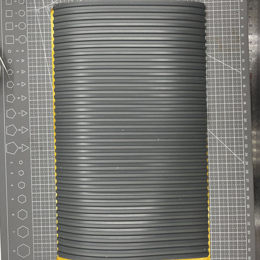 Swiss Bergeon grooved bench mat for watch repair, self-adhesive and durable work surface.