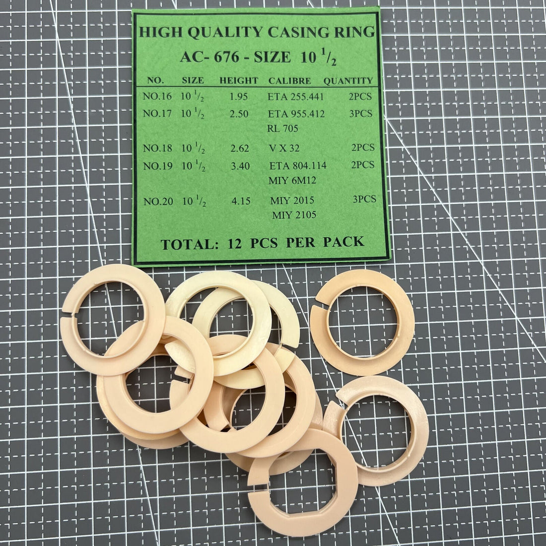 Set of 12 AC-676-10.5 watch case spacer rings for movement casing, perfect for precise assembly.