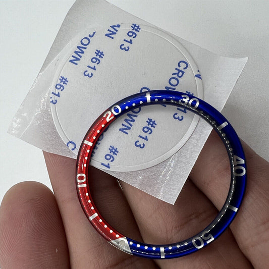 Red and dark blue circular arc aluminum bezel insert for 39mm watch, enhancing style and durability.