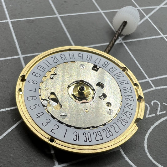 ETA E61.111 watch movement with quartz 3 hands and date display at 6 o'clock, precision engineered.