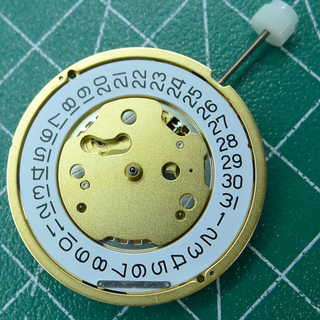 Swiss Made Ronda 5030D quartz watch movement with date at 4 for precise timekeeping and durability.