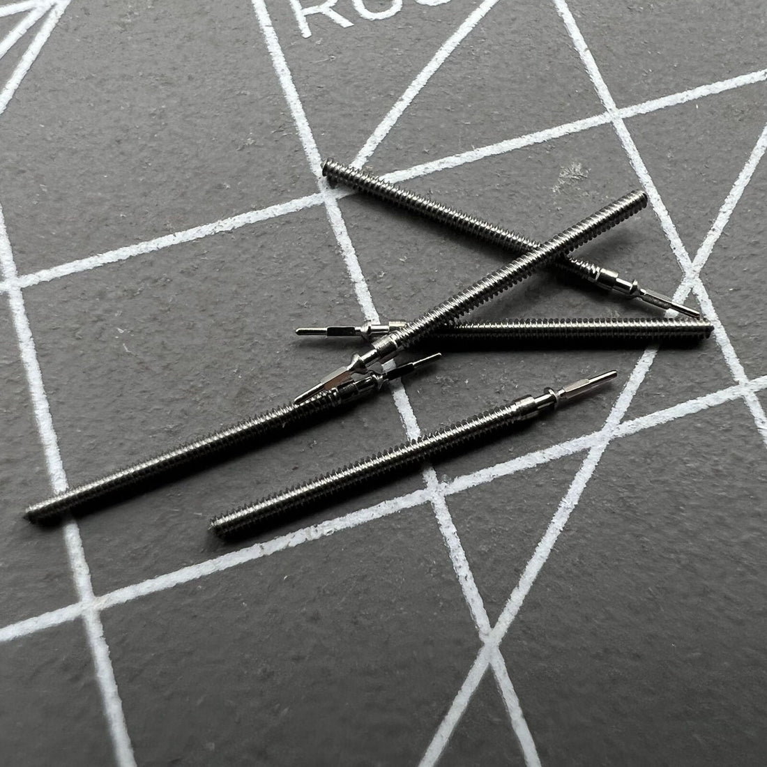 Generic watch winding stems compatible with Miyota 5R21 5R32 movements, precision-crafted components for watch repair.