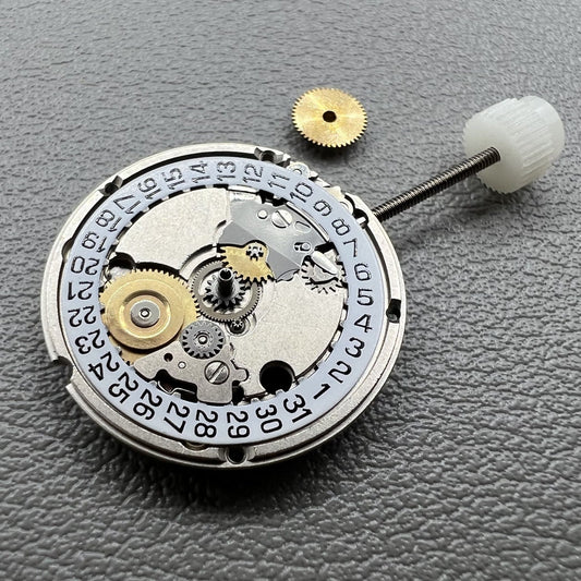 Swiss ETA 556.115 quartz movement with date at 3, 3 hands, precise watch accessory by ETA.