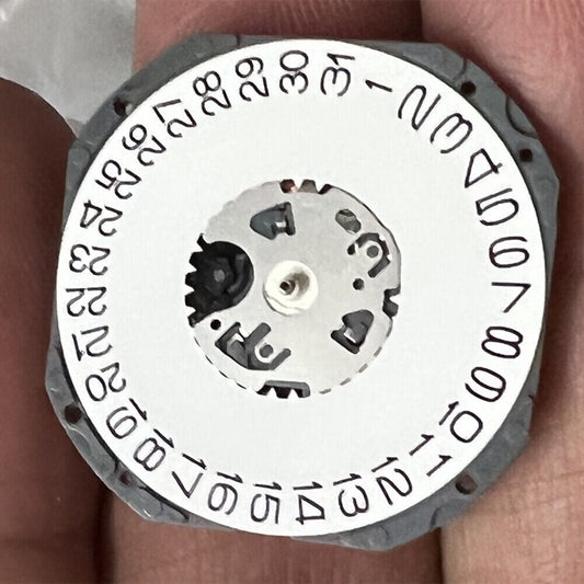 Hattori Epson TMI VJ52 watch quartz movement with date at 3 and 6 o'clock, Japan made accessory.